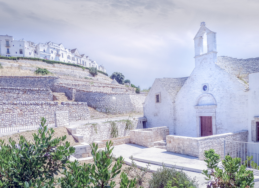 White Village Locorotondo Church in Puglia Italy panorama:

https://www.pictorem.com/1947362/Locorotondo%20Church%20in%20Puglia%20Italy.html