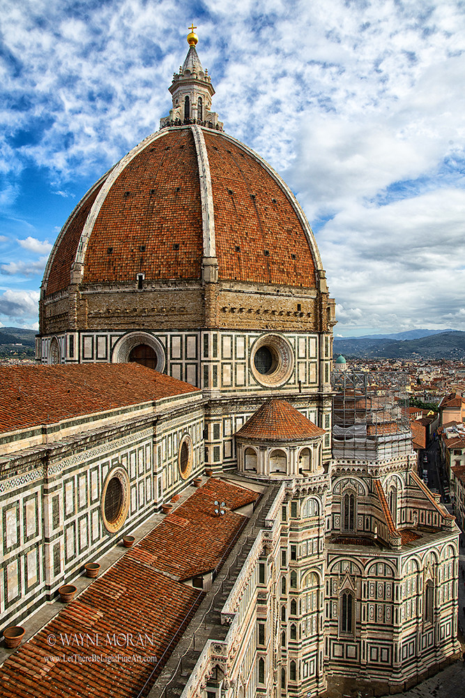 el Duomo The Florence Italy Cathedral View from Tower Vertical

Florence Cathedral, formally the Cattedrale di Santa Maria del Fiore, is the cathedral of Florence, Italy. It was begun in 1296 in the Gothic style to a design of Arnolfo di Cambio and was structurally completed by 1436, with the dome designed by Filippo Brunelleschi. The exterior of the basilica is faced with polychrome marble panels in various shades of green and pink, bordered by white, and has an elaborate 19th-century Gothic Revival façade by Emilio De Fabris.

The cathedral complex, in Piazza del Duomo, includes the Baptistery and Giotto's Campanile. These three buildings are part of the UNESCO World Heritage Site covering the historic center of Florence and are a major tourist attraction of Tuscany. The basilica is one of Italy's largest churches, and until the development of new structural materials in the modern era, the dome was the largest in the world. It remains the largest brick dome ever constructed.

https://fineartamerica.com/featured/el-duomo-the-florence-italy-cathedral-view-from-tower-vertical-wayne-moran.html

Read more: https://waynemoranphotography.com/blog/top-10-reasons-to-visit-florence-italy/

#elduomo, #church, #cathedral, #architecture, #florence, #italy, #UNESCO #fineart, #masterpiece, #photography #travelphotography #fineart #landscapephotography #landscapes #landscape #buyintoart #Ayearforart